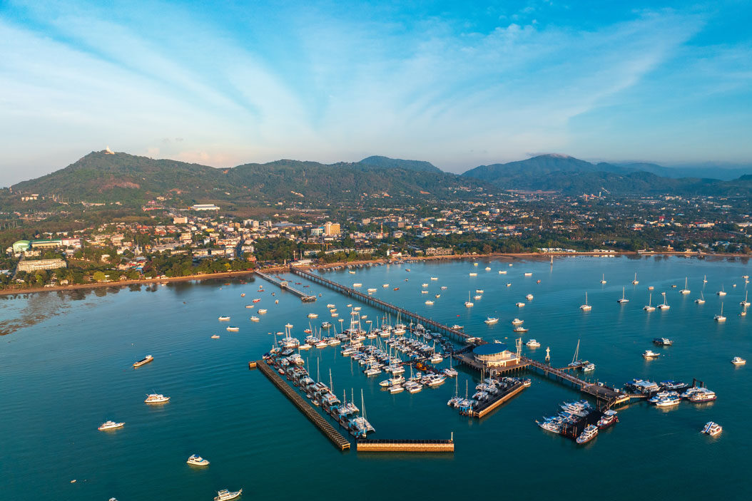 aerial-drone-view-of-chalong-pier-with-many-boats-2024-11-26-00-36-36-utc aerial-drone-view-of-chalong-pier-with-many-boats-2024-11-26-00-36-36-utc