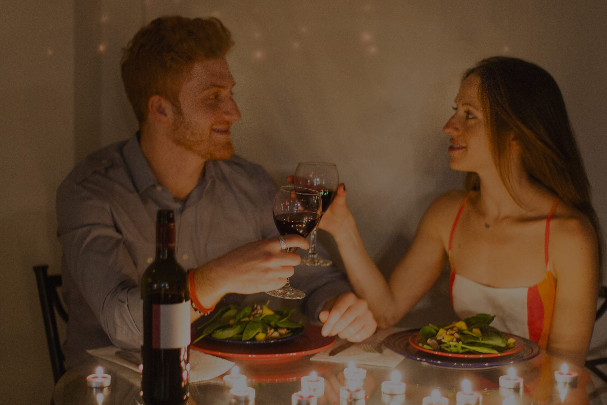 couple-at-table-face-to-face-enjoying-candlelit-me-2025-04-04-18-39-51-utc-scaled