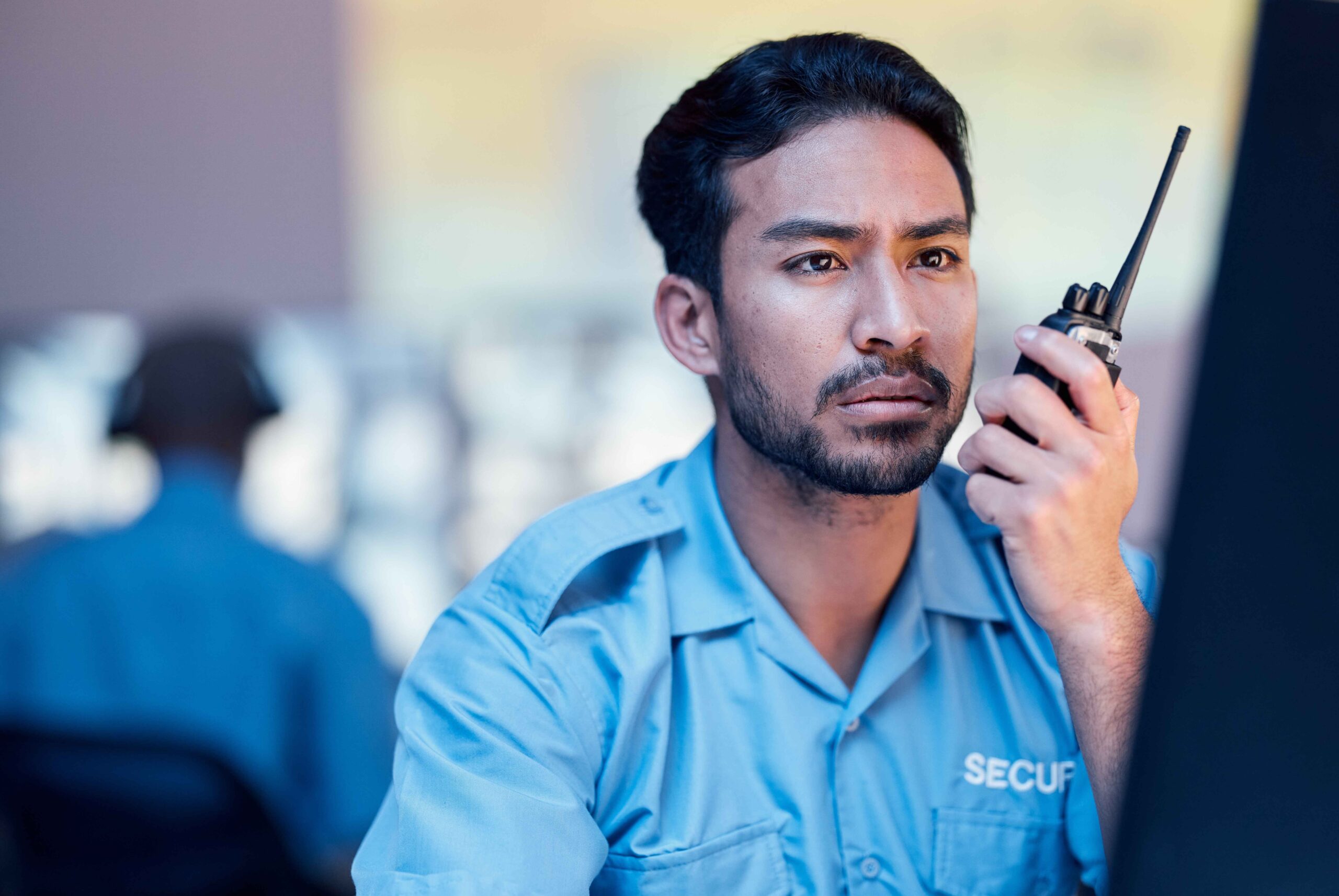 security-dispatch-man-computer-and-walkie-talkie-2025-04-06-09-07-13-utc_11zon security-dispatch-man-computer-and-walkie-talkie-2025-04-06-09-07-13-utc_11zon