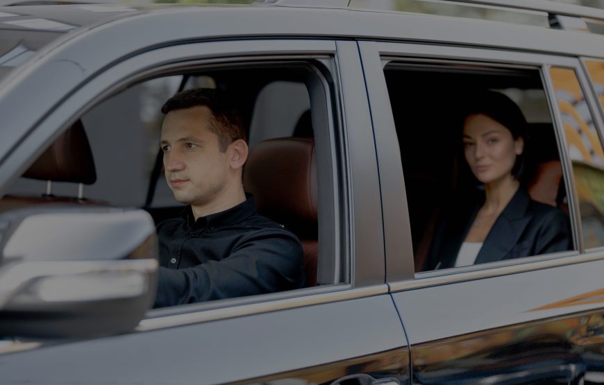 side-view-of-a-luxury-suv-vehicle-with-male-driver-2025-03-15-18-43-22-utc_11zon-scaled-870x555