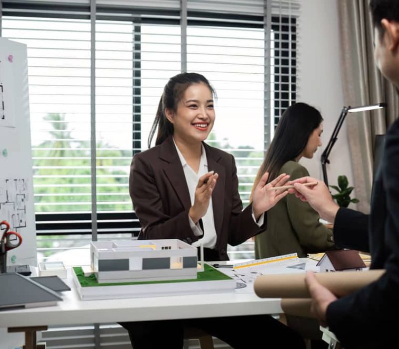 business-team-discussing-real-estate-project-with-2025-01-16-13-30-32-utc