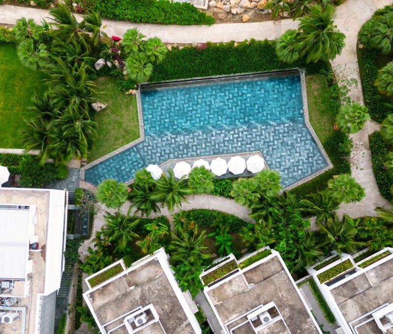 drone-view-luxury-resort-swimming-pool-aerial-sho-2025-03-11-14-12-31-utc